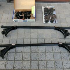 ルーフキャリアバーおよびスキー用アタッチメント