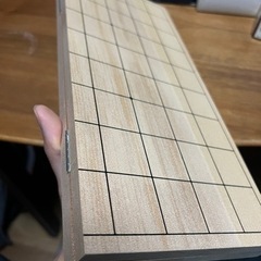将棋盤と駒一式(予備の歩と紙の盤含む)の画像