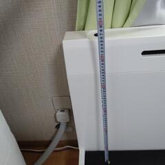 白なダブルベッドの画像