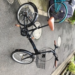 「早い者勝ち」カゴ付き折りたたみ自転車の画像