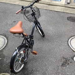 「早い者勝ち」カゴ付き折りたたみ自転車の画像