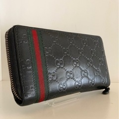 GUCCIシマGG型押しシェリーラインラウンドファスナー長財布