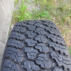 ジープラングラーアンリミテッド純正ホイルセンターキャップカバー付きの画像