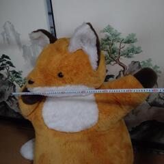 大きなキツネのぬいぐるみの画像