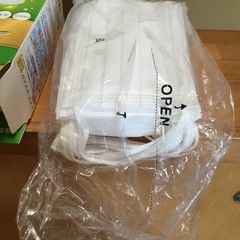 開封&10枚弱使用済みの子ども用不織布マスクの画像