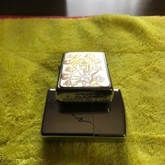 絆の金文字ジッポとオマケ付きジッポの画像