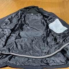 フード付きコートの画像