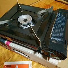 中古　カセットコンロ　未使用ボンベ1本付きの画像
