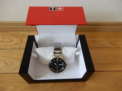 さらに値下げしました！定価の半額以下絶対お買い得。TISSOT シースター 600m防水 ブルー 保証書他付属品付き 超美品。