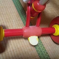 ミッキーの手押し棒付き三輪車の画像