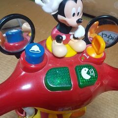 ミッキーの手押し棒付き三輪車の画像