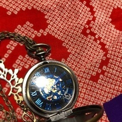 手巻きの懐中時計の画像