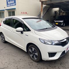 【金利０円・自社ローン】フィットハイブリットナビ/バックカメラ/ETC/スマートキー/Bluetooth/TV 【車検２年付】の画像