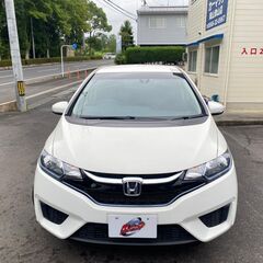 【金利０円・自社ローン】フィットハイブリットナビ/バックカメラ/ETC/スマートキー/Bluetooth/TV 【車検２年付】の画像