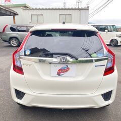 【金利０円・自社ローン】フィットハイブリットナビ/バックカメラ/ETC/スマートキー/Bluetooth/TV 【車検２年付】の画像