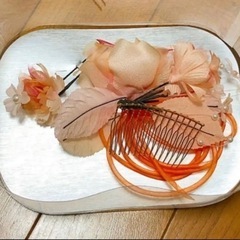 オレンジの髪飾りの画像