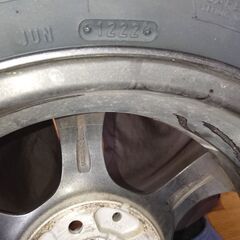155 65R/14サイズの新品未使用タイヤと中古アルミホイールのセットの画像