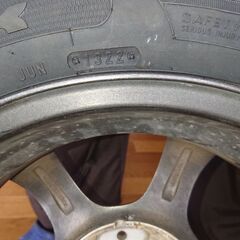 155 65R/14サイズの新品未使用タイヤと中古アルミホイールのセットの画像