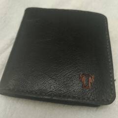 【取引完了しました】Ｔマークの男性用財布　使いやすです。の画像