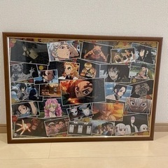 鬼滅の刃のジグゾーパズル、額付きの画像
