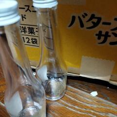 花瓶に　スヌーピーお酢の瓶の画像