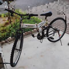 マウンテン風折り畳み自転車と工具とバック