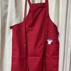 赤のエプロンの画像