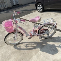 自転車　18インチ　補助輪・ヘルメット付き　女児の画像