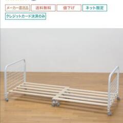 ニトリ　伸縮布団収納ラックの画像