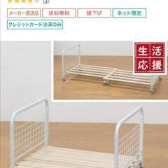 ニトリ　伸縮布団収納ラックの画像