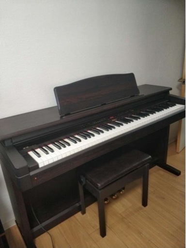 新春値下げ(大阪市内送料無料)動作確認済み、椅子付き　 音が綺麗なRoland 電子ピアノ HP330