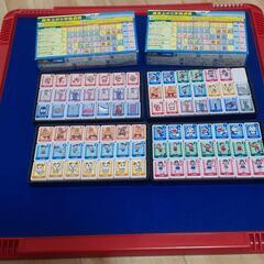 ドラえもんのドンジャラとドラえもんのぬいぐるみ2個の画像