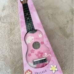 ハワイで購入した可愛いピンクのウクレレです。