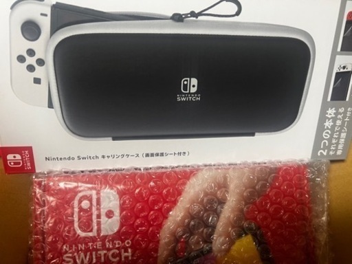 (購入相手決定)任天堂Switch有機EL白 新品未開封 新品未開封の白キャリングケース付き