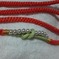 コーラルピンク振袖用帯あげ帯締未使用セットの画像