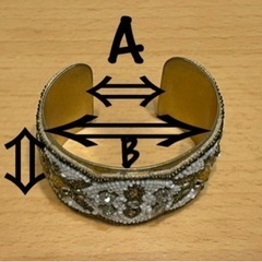 エーヴィーマックス バングル 石を止めてる金具１つと小さな石６ヶ所欠損
の画像