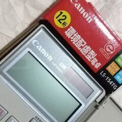 カシオの電子辞書とキャノン電卓　（現在、出品中の木製本立てと一緒にお引きとりで０円）の画像