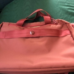 ツインのオレンジのバッグ（小旅行用）の画像