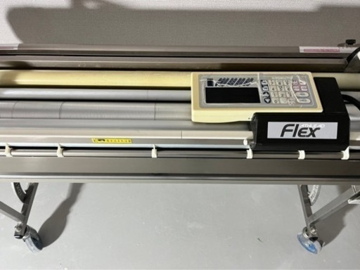 クロス糊付け機