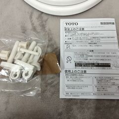 【値下げしました】未使用未開封  便座 TOTO 丸前 普通 洋式 蓋付き ホワイト  TC290 #NW1 トイレ 説明書付き 4/18の画像