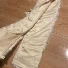 passage mignon ファー マフラー ジレの画像