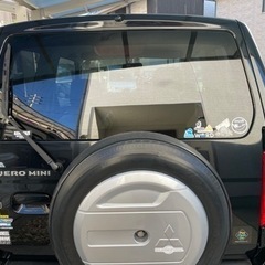 平成21年パジェロミニ　黒　リフトアップ　MT車の画像