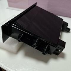 カーオーディオ。1DNサイズ小物入れの画像