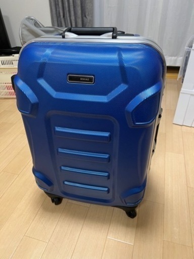 取引決定　スーツケース