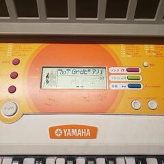 YAMAHA ヤマハ 電子キーボード タッチレスポンス 光る鍵盤 EZ-J210 61鍵盤 ポータブルキーボード ホワイト オレンジ

の画像