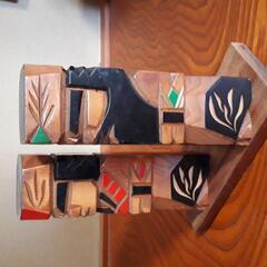 アイヌ木彫りの人形の画像