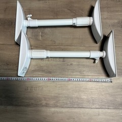 地震　突っ張り棒の画像