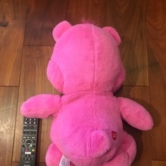 ケアベアピンクぬいぐるみの画像