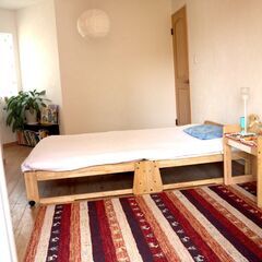 スムーズな木製折りたたみベッドの画像