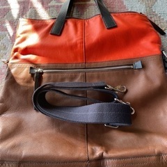 coachメンズバック　バイカラーの画像